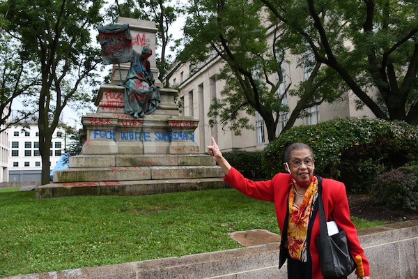 D.C. Del. Eleanor Holmes Norton, who introduced a bill last summer to remove a statue of Confederate Gen. Albert Pike from an area near Judiciary Square, stands on June 20 in front of what remained of the structure, which was torn down and burned by protesters the previous day during Juneteenth-related demonstrations. (Roy Lewis/The Washington Informer)
