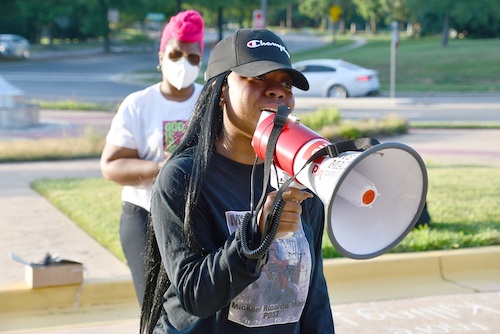 Kiah Minor gives emotional testimony about her father, Michael Ricardo Minor, who was fatally shot by Prince George's County Police in October 2014, at a rally in Bowie on July 1. (Anthony Tilghman/The Washington Informer)