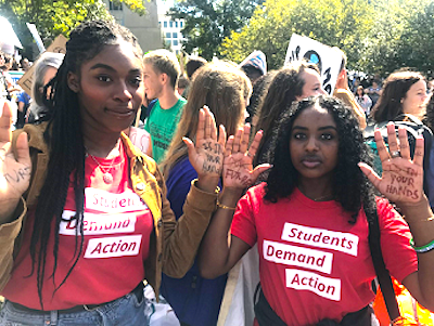 Angel Nwadibia (left) and Leena Mohamed participate in the Global Climate Change protest in northwest D.C. in September. (Courtesy of Angel Nwadibia)