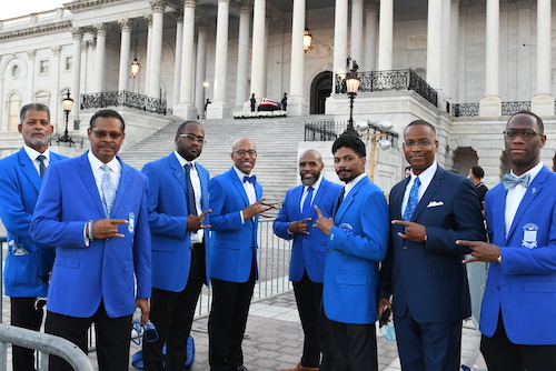 Members of Phi Beta Sigma Fraternity, Inc., dressed in their signature blue blazers, stand proudly to support their brother, the late Rep. John Lewis, during final tributes in the District. (Roy Lewis/ The Washington Informer)