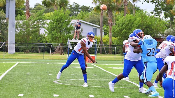 Florida Memorial quarterback Antoine Williams attempts a pass in the university's first game since 1958. (Florida Memorial Athletic Department via Howard University News Service)