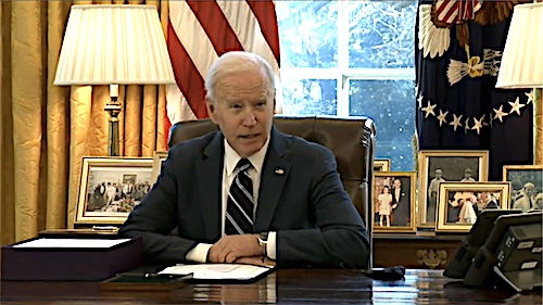 President Joe Biden signs the American Rescue Plan — his sweeping $1.9 trillion coronavirus relief package — into law at the White House on March 11.