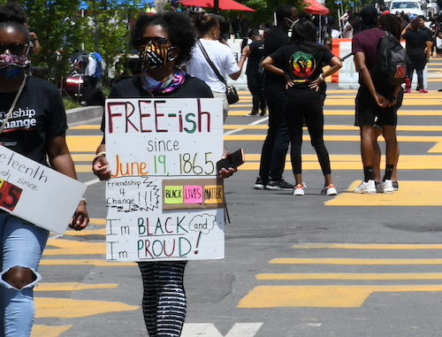 **FILE** In 2020, two blocks on 16th Street between K and H Streets in northwest D.C. was renamed "Black Lives Matter Plaza.” People celebrated Juneteenth on the Plaza protesting the murder of George Floyd. (Roy Lewis/The Washington Informer)