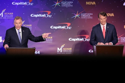 Democratic candidate Terry McAuliffe (left) debates with Republican candidate Glenn Youngkin during the Virginia gubernatorial debate at Northern Virginia Community College in Alexandria on Sept. 28. (Pool Photo/Win McNamee-Getty Images)