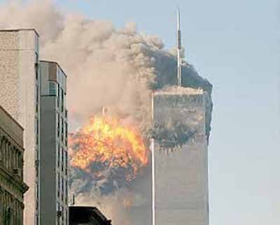 Terrorist-led airplanes crash into the World Trade Center in New York. (Courtesy of Robert J. Fisch via Wikimedia Commons) 