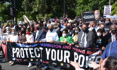 Martin Luther King III, with his wife Andrea and daughter Yolanda march with Rev. Al Sharpton, Rep. U.S. Rep. Shelia Jackson Lee (D-Texas, 18th District), and U.S. Rep. Al Green (D-Texas, 9th District) during the March on Washington for Voting Rights in northwest D.C. on Aug. 28. (Roy Lewis/The Washington Informer)