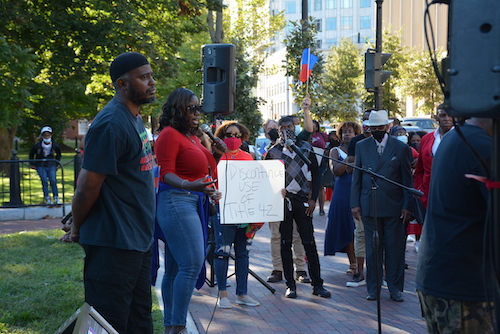 This past September, protesters including Ward 8 ANC Salim Adofo and Marie, representing Haitian professionals, asked for support for Haitians in Texas who faced deportation. (Courtesy photo)