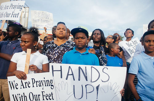 Black children are often subjected to pepper spray, tasers, muscling, takedowns and other use of force tactics by police. (Jamelle Bouie via Wikimedia Commons)