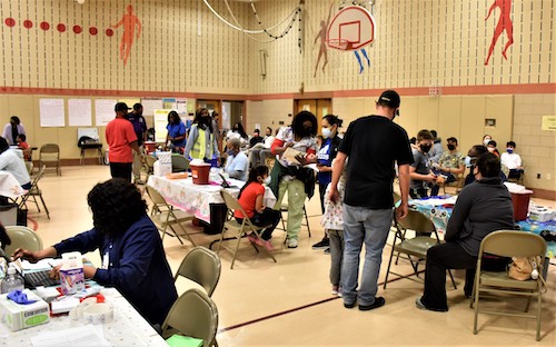 Participants get coronavirus vaccinations at a clinic at Judge Sylvania Woods Elementary in Glenarden, Maryland, on Nov. 8, the first day of the clinics for children ages 5 to 11 in Prince George’s County. (Robert R. Roberts/The Washington Informer)