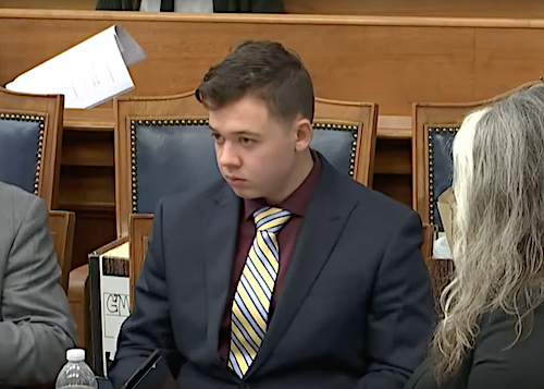 Kyle Rittenhouse listens during his murder trial at the Kenosha County Courthouse in Kenosha, Wis., on Nov. 11. The 18-year-old is accused of killing two people and wounding a third during a protest over police brutality in Kenosha in August 2020.