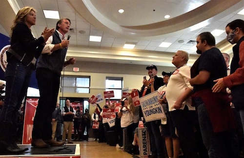 Virginia Republican gubernatorial nominee Glenn Youngkin (second from left) stands next to his wife Suzanne Youngkin during a rally inside Manassas Park Community Center in Manassas Park, Virginia, on Oct. 30. (Robert R. Roberts/The Washington Informer)