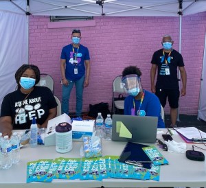 Whitman-Walker’s Community Health team conducting outdoor HIV/STI testing at Whitman-Walker's Max Robinson Center during summer 2020 of the COVID-19 pandemic in historic Anacostia in southeast Washington, D.C. (Courtesy of Whitman-Walker Health)