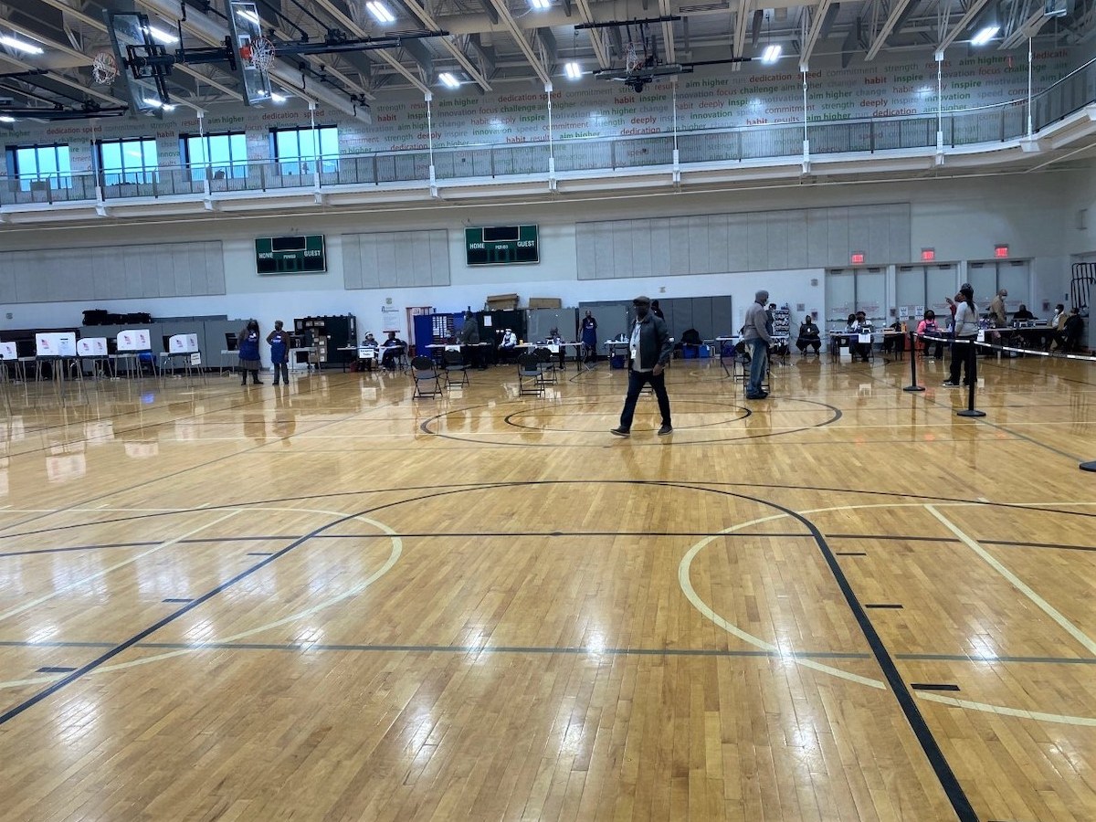 Election workers inside the Southern Regional Technology and Recreation Complex in Fort Washington, Maryland, on Dec. 27, the first day of early voting in a special primary for the Prince George's County Council's District 8 seat. (William J. Ford/The Washington Informer)