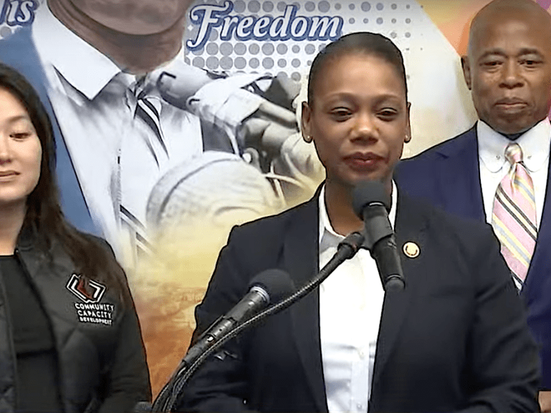 Keechant Sewell speaks during a press conference at the Queensbridge Houses in the Queens borough of New York on Dec. 15, 2021, to announce that Mayor-elect Eric Adams (right) has named Sewell as the city's next police commissioner. (Screen shot from video courtesy of WABC-TV)