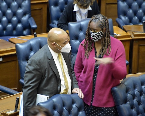Del. Dereck Davis of Prince George’s County (left) chats with Del. Stephanie Smith of Baltimore City after the first session in the House of Delegates adjourned Dec. 6. (Robert R. Roberts/The Washington Informer)