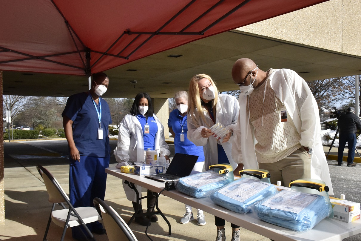 University of Maryland Laurel Medical Center staffers assess medical supplies on Jan. 6 in preparation for its operation as one of 10 COVID-19 testing sites at local hospitals slated to open the following week. (Robert R. Roberts/The Washington Informer)