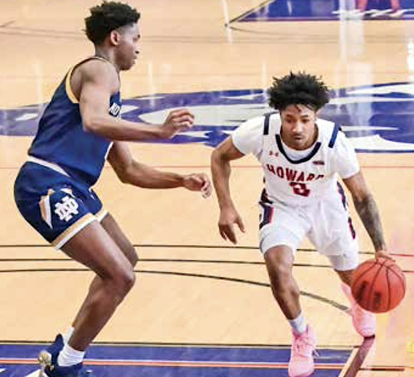 Freshman Howard Bison guard Elijah Hawkins (3) tallied 12 points and five assists in Howard's loss to Notre Dame in the MLK Classic on Jan. 17. (Photo by Yusuf Abdullah)