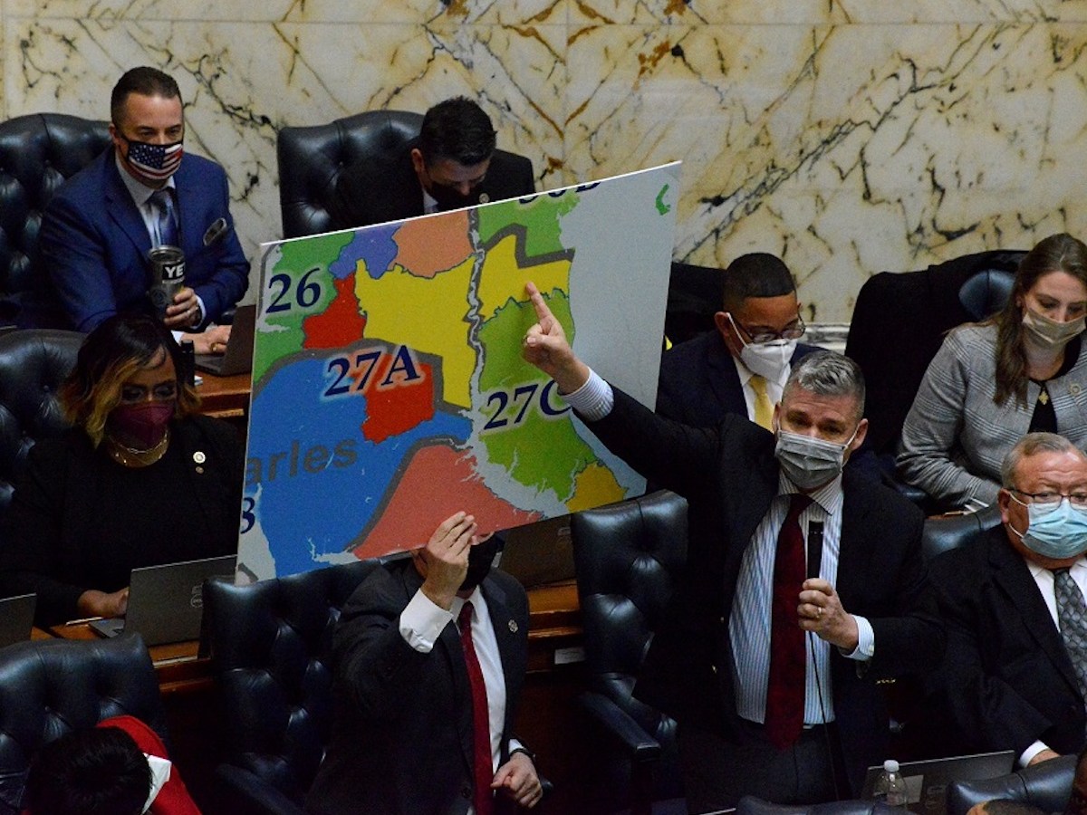 Maryland Del. Mark Fisher (R-Calvert County) speaks against a new legislative redistricting map during a session in the House chamber in Annapolis on Jan. 27. Fisher said the map would separate his new legislative district by the Patuxent River with no bridge, which would cause some drivers to travel at least 35 minutes from one side of the district to the other. (Robert R. Roberts/The Washington Informer)