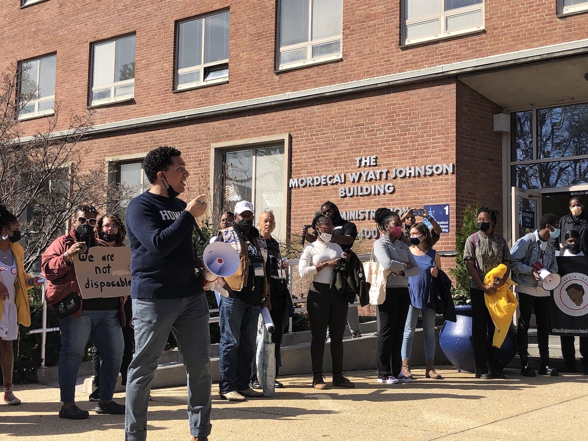 Professor Cyrus Hampton addresses a group of supporters at a rally over faculty working conditions and wages. (Chanel Cain/HUNS)