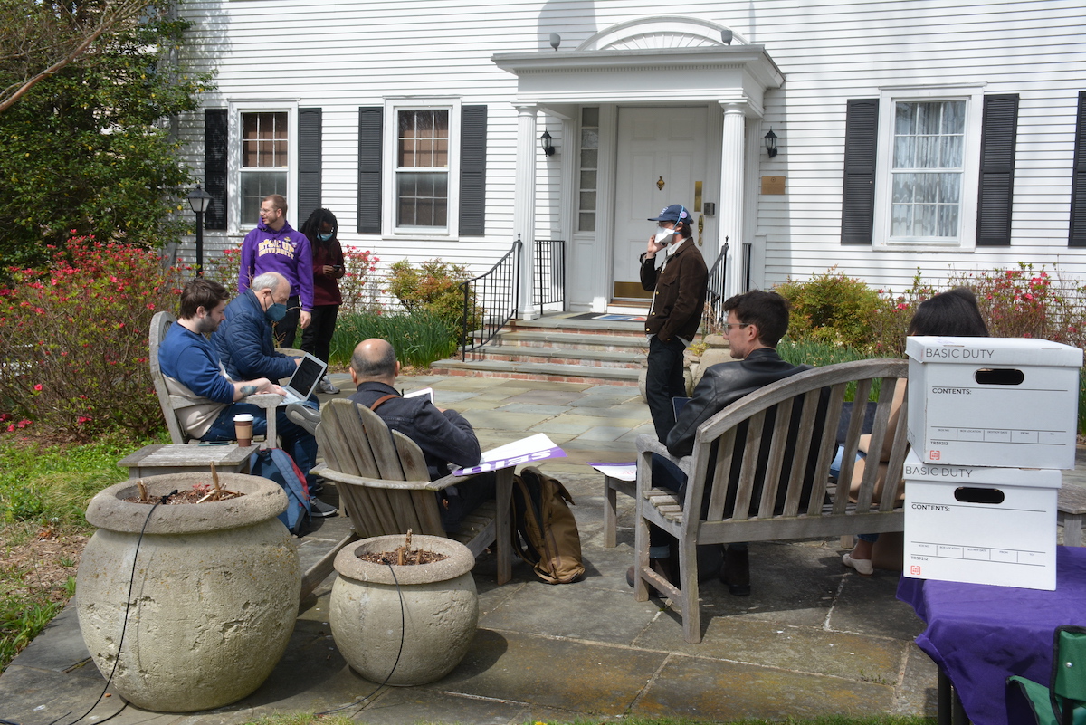 American University faculty members talk about their plans for a protest in front of the university president's house in northwest D.C. on April 21. (Roy Lewis/The Washington Informer)