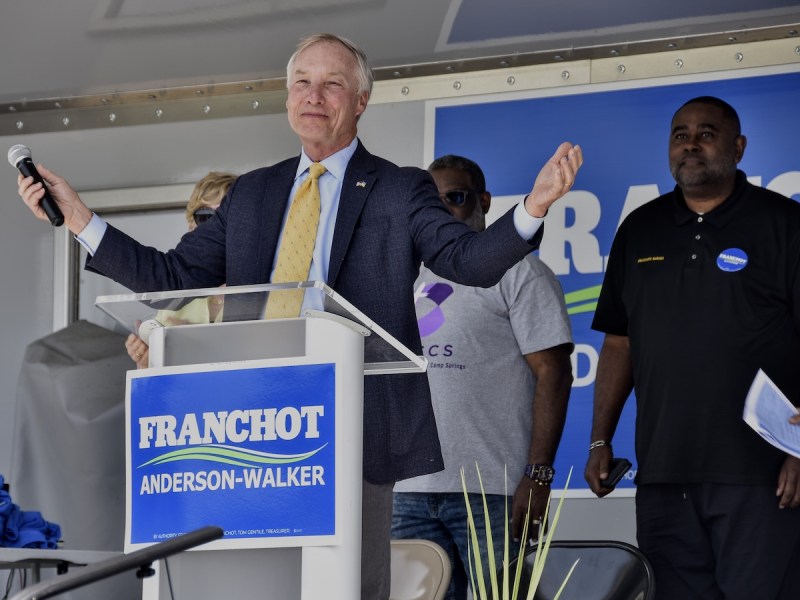 Maryland comptroller and Democratic gubernatorial candidate Peter Franchot extends his arms in appreciation after receiving a standing ovation during an April 23 community rally at Tucker Road Athletic Complex in Fort Washington. (Robert R. Roberts/The Washington Informer)