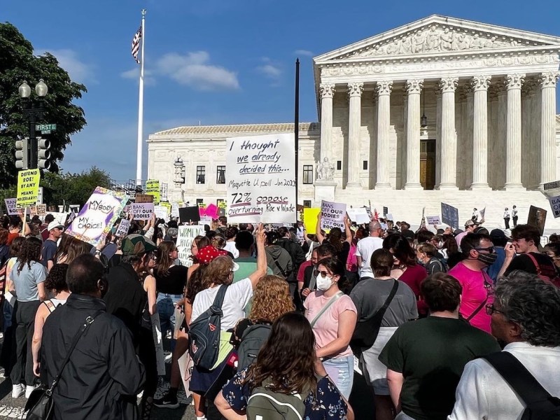 Demonstrators stand outside the Supreme Court building in D.C. on May 3 to protest the leaked abortion opinion seeking to overturn Roe v. Wade. (Anthony Tilghman/The Washington Informer)