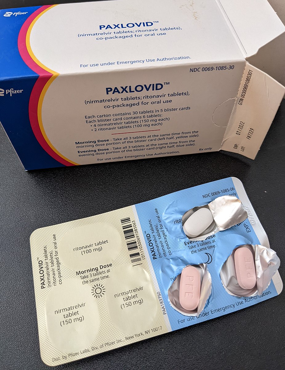 **FILE** Paxlovid blister pack, partially opened to reveal one Ritonavir tablet and two Nirmatrelvir tablets (Courtesy of Kches16414 via Wikimedia Commons)