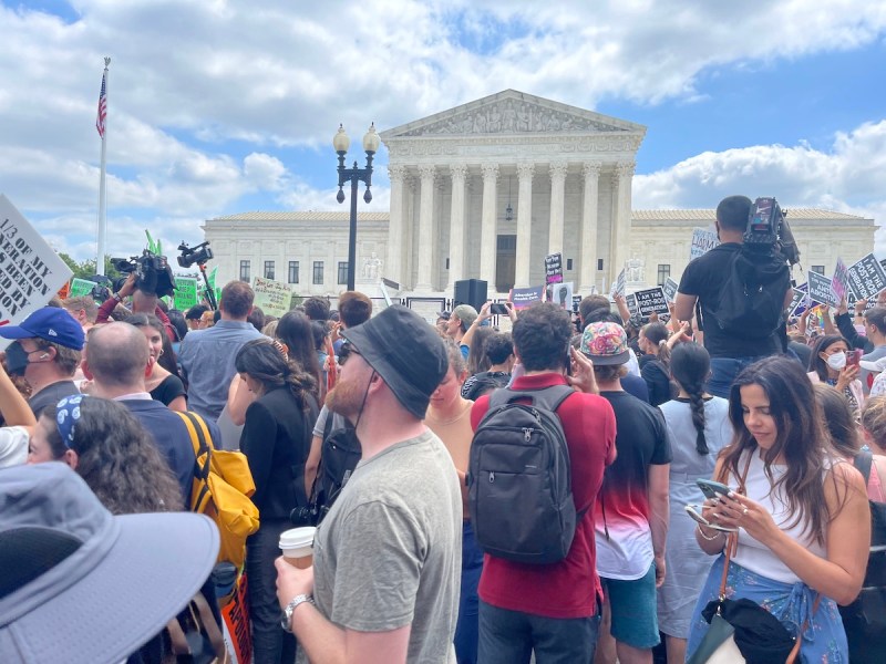 Demonstrators converge outside the Supreme Court building in D.C. on June 24 after it was announced that the court overturned Roe v. Wade. (Roy Lewis/The Washington Informer)