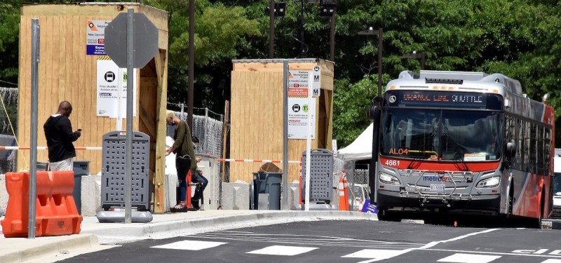 A Metro shuttle bus is seen here at the New Carrollton Metro station on May 28. The free service will be provided for riders while platform work is conducted there and at four other Orange Line stations. (Robert R. Roberts/The Washington Informer)