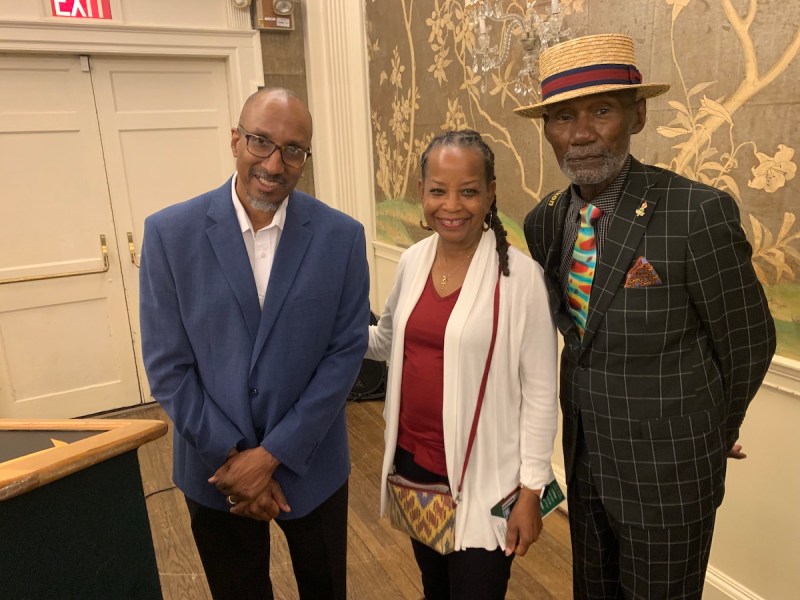 Norman Parish III, son of late artist Norman Parish Jr., Washington Informer Publisher Denise Rolark Barnes and Informer photographer Roy Lewis attend a preview of the documentary "Walls of Respect: Norman Parish and the Parish Art Gallery" at the City Tavern Club in Washington, D.C., on June 6.