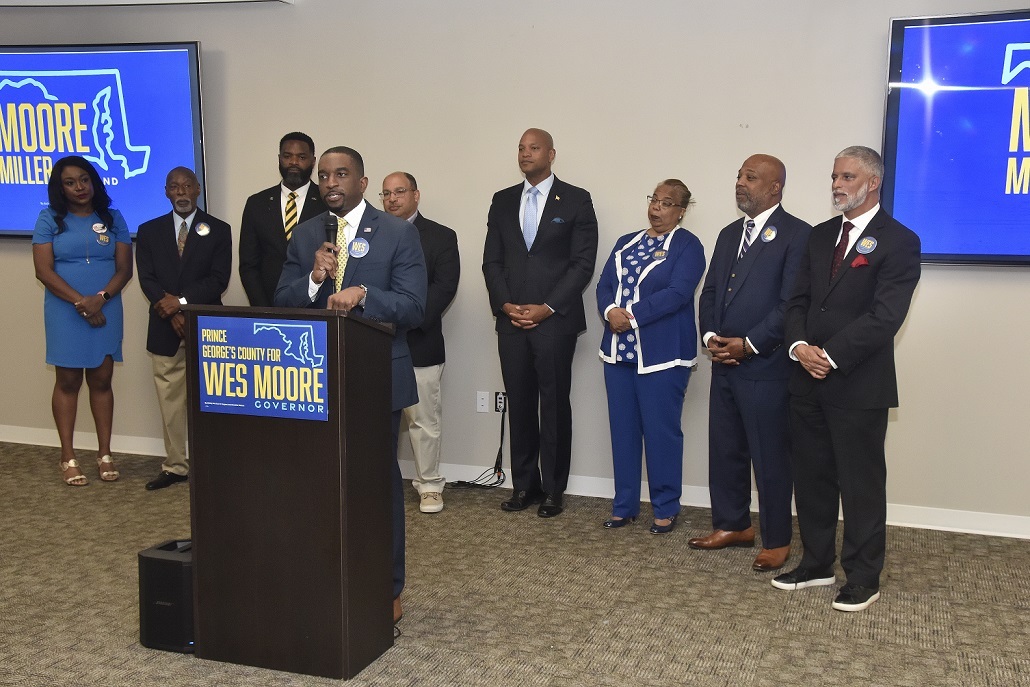 Prince George’s County Council member Mel Franklin speaks behind a lectern on June 29 where the majority of County Council members endorse Democratic candidate Wes Moore for Maryland governor. (Robert R. Roberts/The Washington Informer)