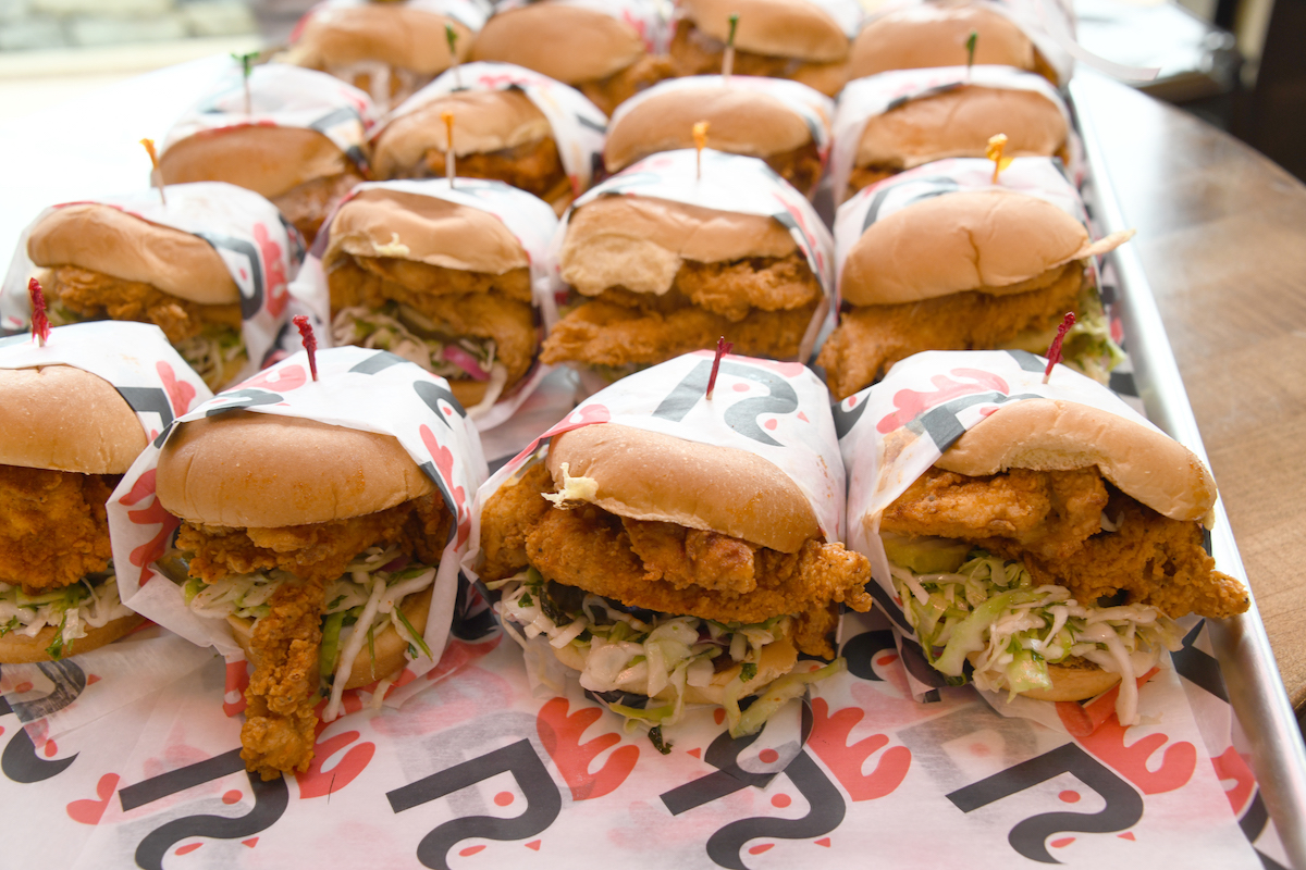 A tray of Roaming Rooster chicken sandwiches is ready for hungry customers at the Skyland area location in Ward 7. (Anthony Tilghman/The Washington Informer)