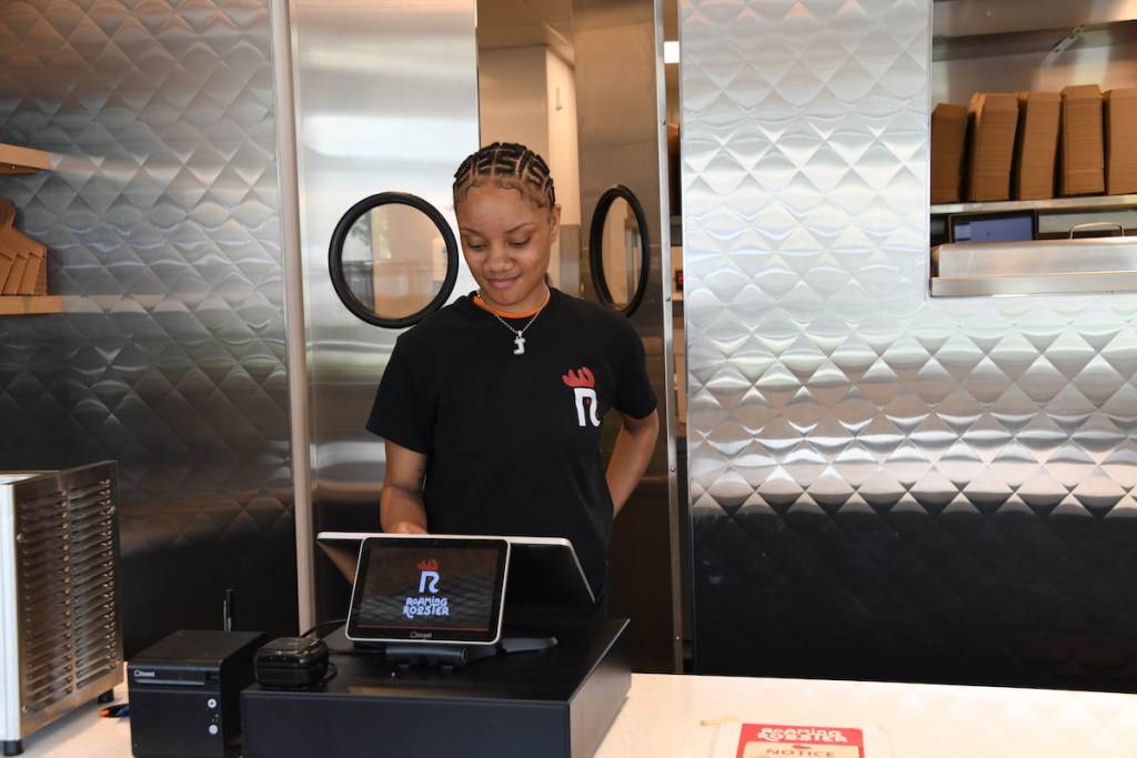 Joslyn Goldring is one of the front-line staff at the Skyland Plaza location in Ward 7. (Anthony Tilghman/The Washington Informer)