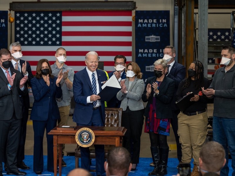 **FILE** President Joe Biden signs an executive order on project labor agreements at Ironworkers Local 5 building in Largo, Maryland, on Feb. 4. (Courtesy of the White House)
