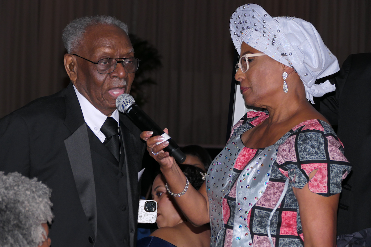 Dr. Frances "Toni" Murphy Draper (right), the AFRO Newspaper's CEO and publisher, recognizes Moses J. Newson, who was the paper's editor in the late 1950s, during the AFRO's 130th anniversary gala at Martin's Crosswinds in Greenbelt, Md., on Aug. 13. (Shevry Lassiter/The Washington Informer)