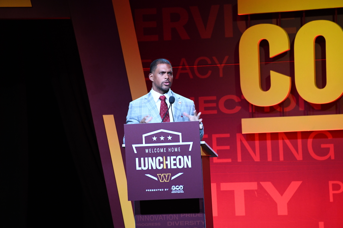 Washington Commanders Team President Jason Wright addresses the Welcome Home Luncheon gathering. (Anthony Tilghman/The Washington Informer)