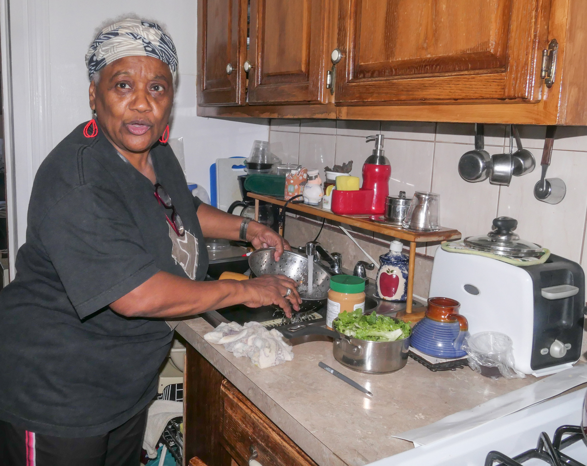Rosa Lee, a resident in northeast D.C. and volunteer with Washington Interfaith Networks, talks about learning the harmful pollutants from natural gas. (Shevry Lassiter/The Washington Informer)