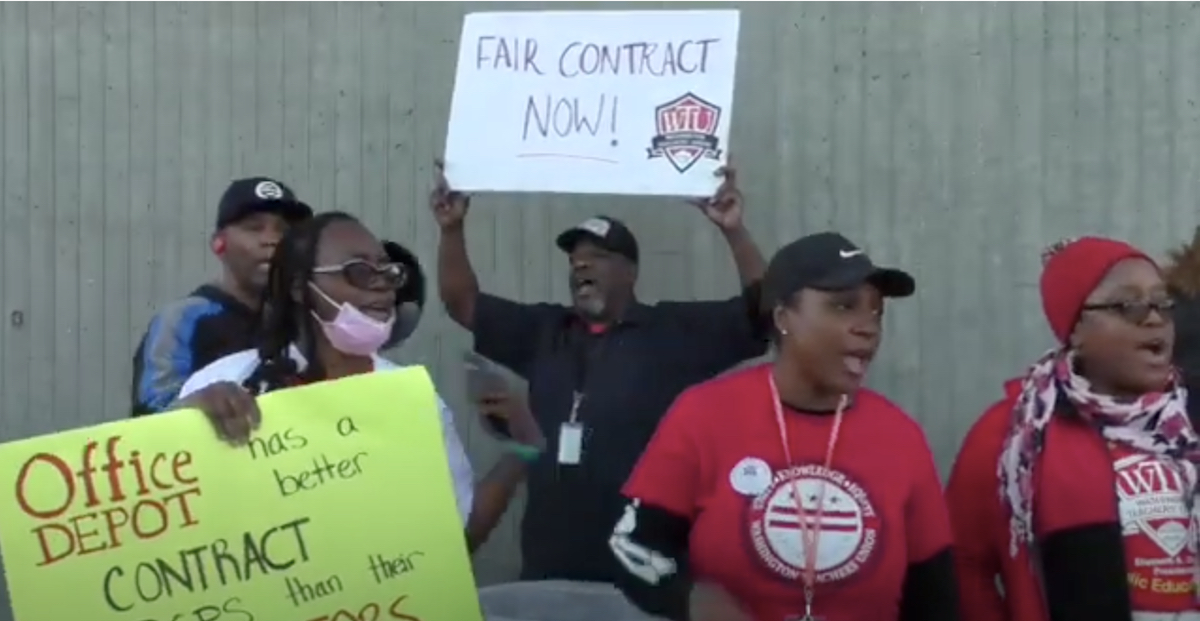 Teachers with the Washington Teachers' Union march for a new contract in front of the Anacostia Metro Station. (Courtesy of WTU)