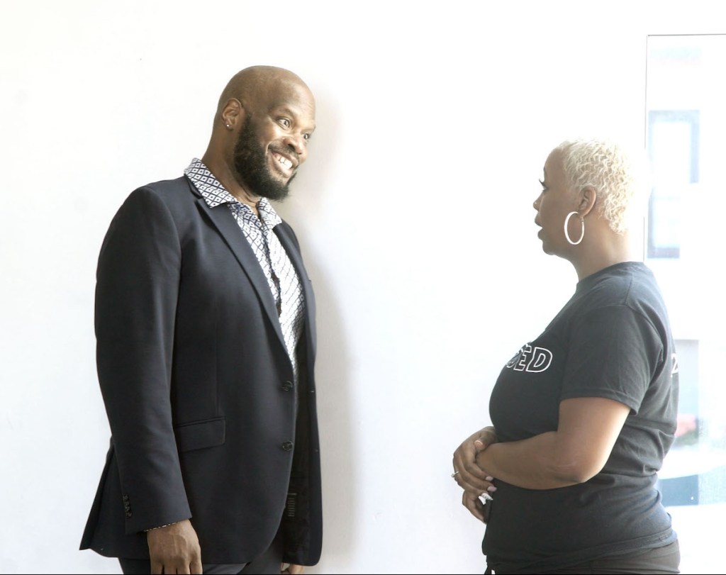 Chet Bennett (left), founder of Bennett Career Institute in northeast D.C., and Kareema Graham, a barbering student (Courtesy of City Dreamz Entertainment LLC)