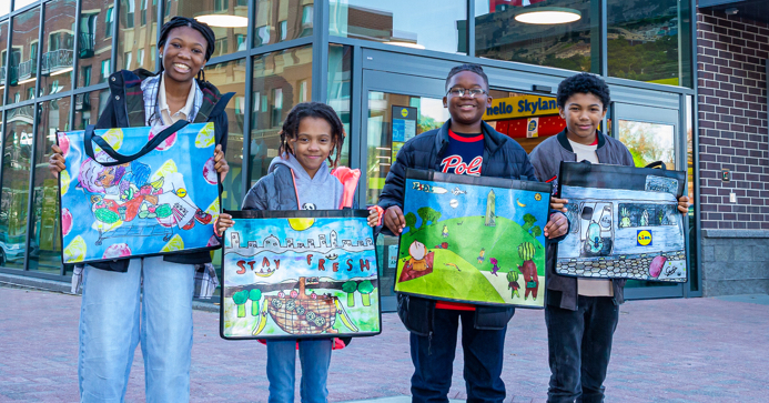 Akilah Daniels, Gabriel Trembath-Nicholson, Nyzear Allen and Zoe Amen outside of the Lidl at Skyland Town Center in southeast Washington. (Courtesy of Lidl)