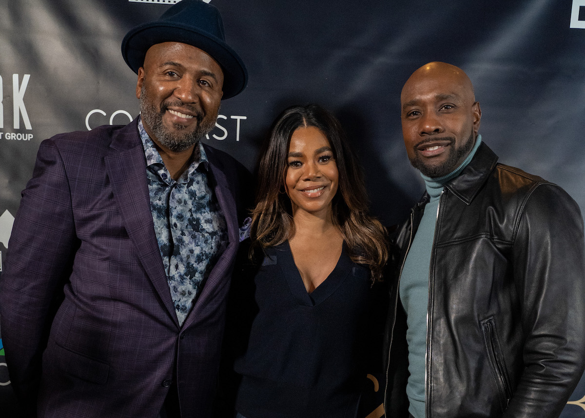 Director Malcolm Lee and actors Regina Hall and Morris Chestnut on the red carpet for the Washington, D.C., premiere of “The Best Man: The Final Chapters” (Marckell Williams/The Washington Informer)