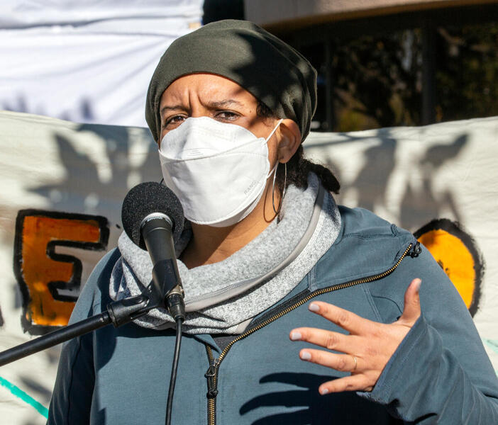 Dany Sigwalt, climate justice advocate and managing director of Green Leadership Trust, speaks at a climate rally outside the DNC in 2020. (Courtesy photo)