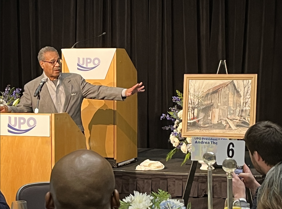 A leader in housing reform, Rep. Emmanueal Cleaver (D-Missouri), UPO Annual MLK King Breakfast keynote speaker, points to the two-room shack in Texas where he was raised without running water, indoor plumbing or electricity. (D.R. Barnes/The Washington Informer)