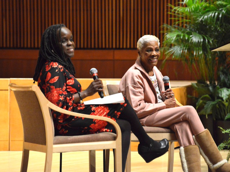 Stephanie Shonekan (left), dean of the College of Arts and Humanities at the University of Maryland, in conversation with music icon Dionne Warwick at the University of Maryland's College Park campus on Feb. 22. (Robert R. Roberts/The Washington Informer)