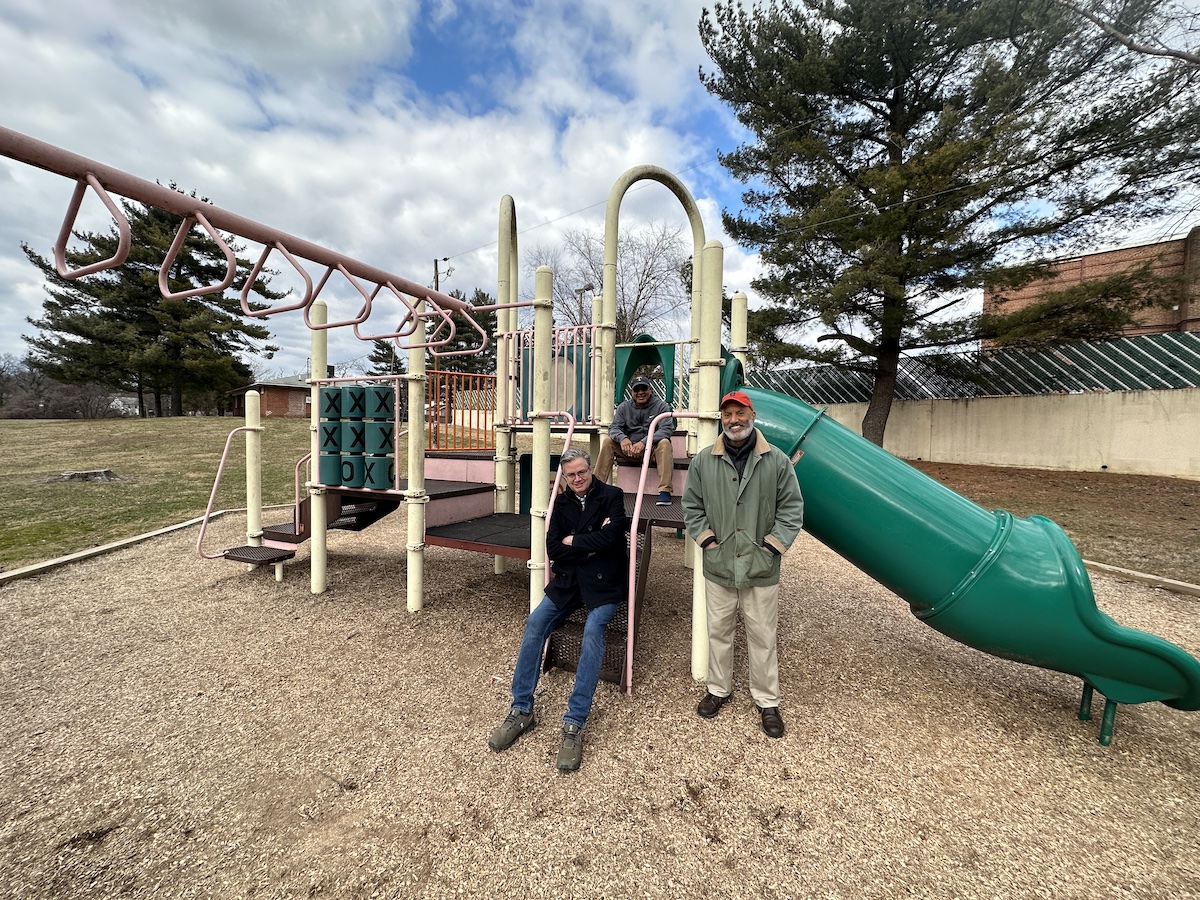 Community members fought to protect this playground after learning about a zoning proposal for a 16-pump Royal Farms gas station that would have required its removal. From left: Jeff Cronin, Al Powell, Paul Rowe. (Anthony Tilghman/The Washington Informer)