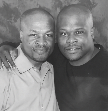 Tony Lewis Sr. (left) and his son Tony Jr. pose for a photo. After serving more than 30 years in prison and his son’s longtime fight to reverse his life sentence, Tony Sr. is now free. (Courtesy photo)