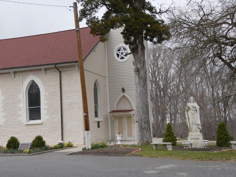 The Sacred Heart Cemetery, located in a lot behind the church, is the burial site of dozens of slaves. As of yet, there is no signage or historic status for their gravesite. (Anthony Tilghman/The Washington Informer)