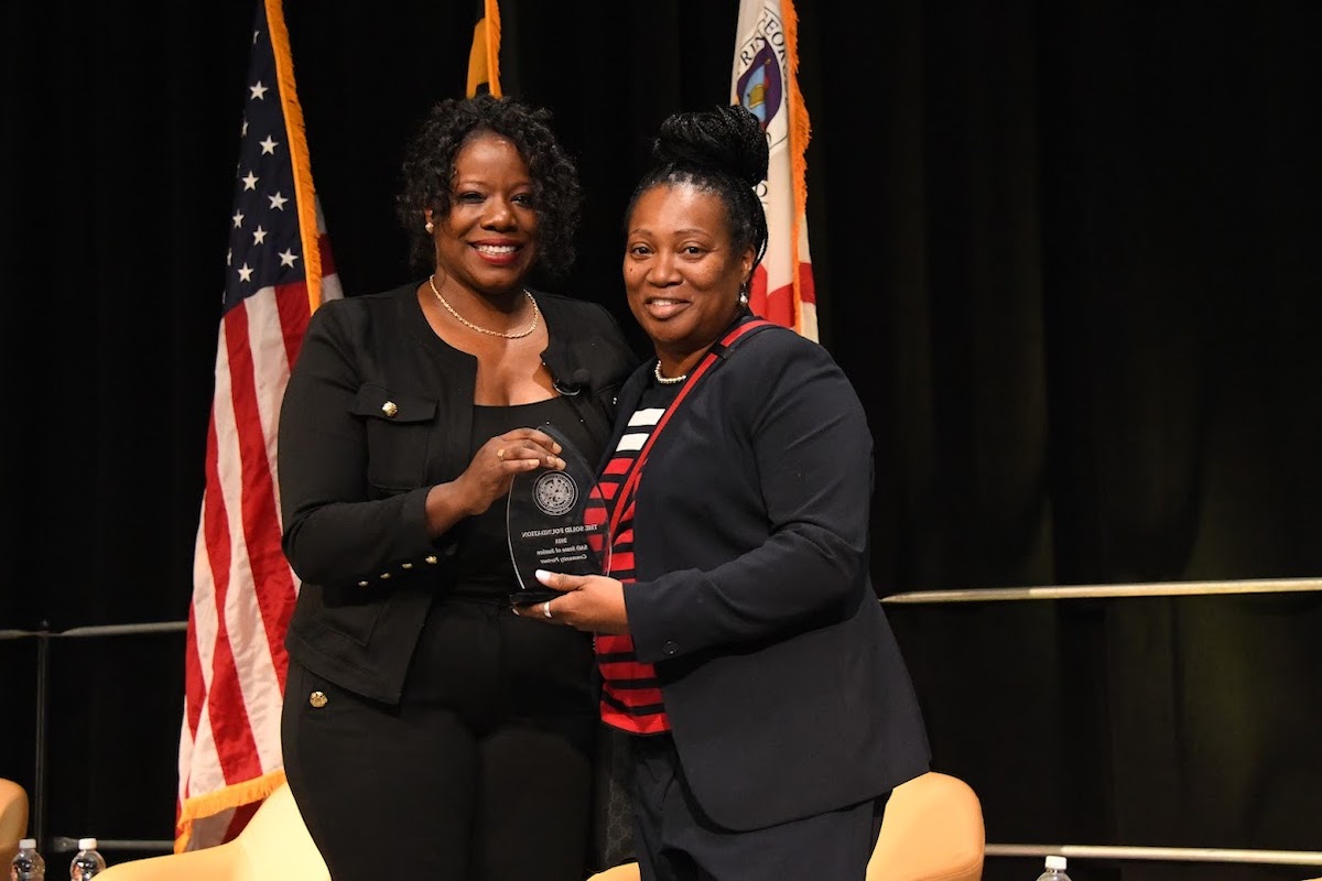 LaTasha Ward (right) was recently given an award from Prince George's County State’s Attorney Braveboy (left) for community service. (Anthony Tilghman/The Washington Informer)