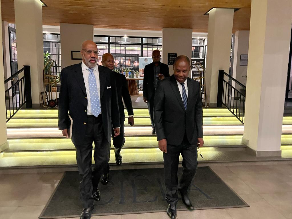 Austin R. Cooper Jr. and the Hon. Batuke Imenda, secretary-general of the United Party for National Development (UPND), leave a dinner meeting in Lusaka. (Courtesy photo)