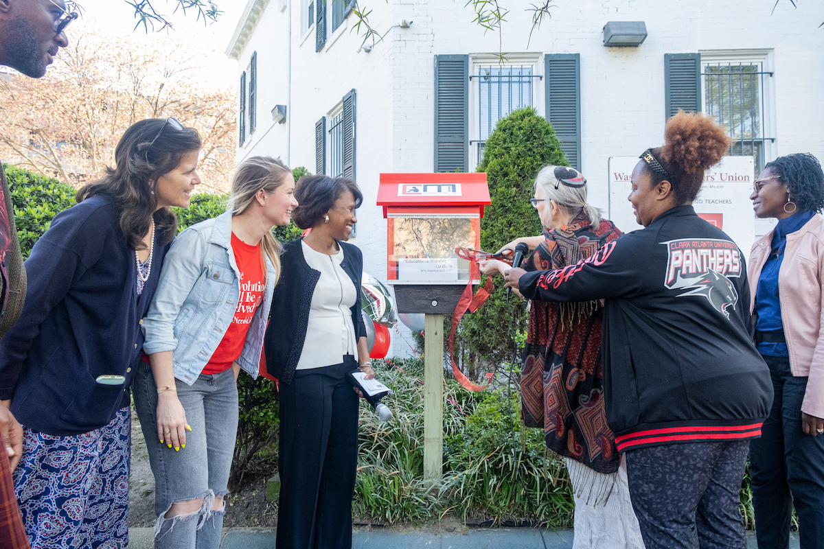 The Washington Teachers' Union and We Act Radio co-hosted a ribbon-cutting ceremony on the steps of the union headquarters for the newly refurbished free library named in honor of the late WTU President Elizabeth Davis. (Ja'Mon Jackson/The Washington Informer)
